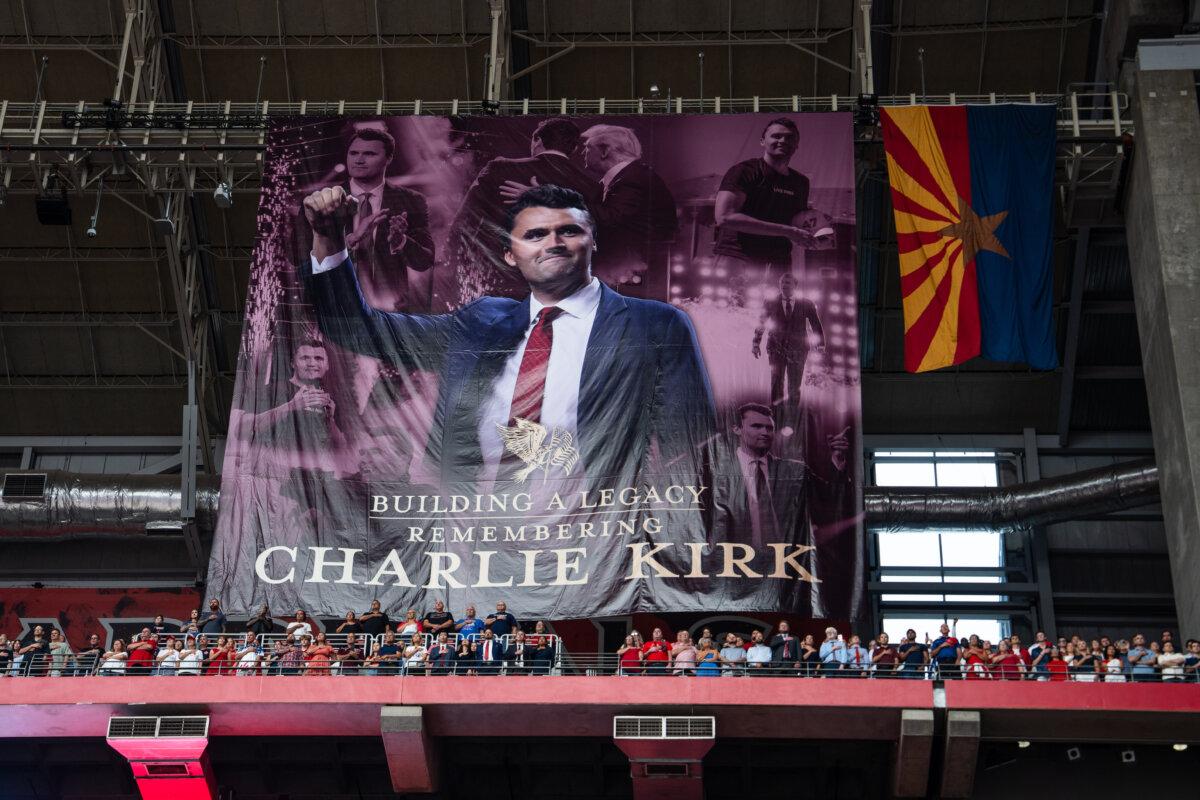 People take part in the Building a Legacy: Remembering Charlie Kirk memorial event at State Farm Stadium in Glendale, Ariz., on Sept. 21, 2025. (Madalina Kilroy/The Epoch Times)