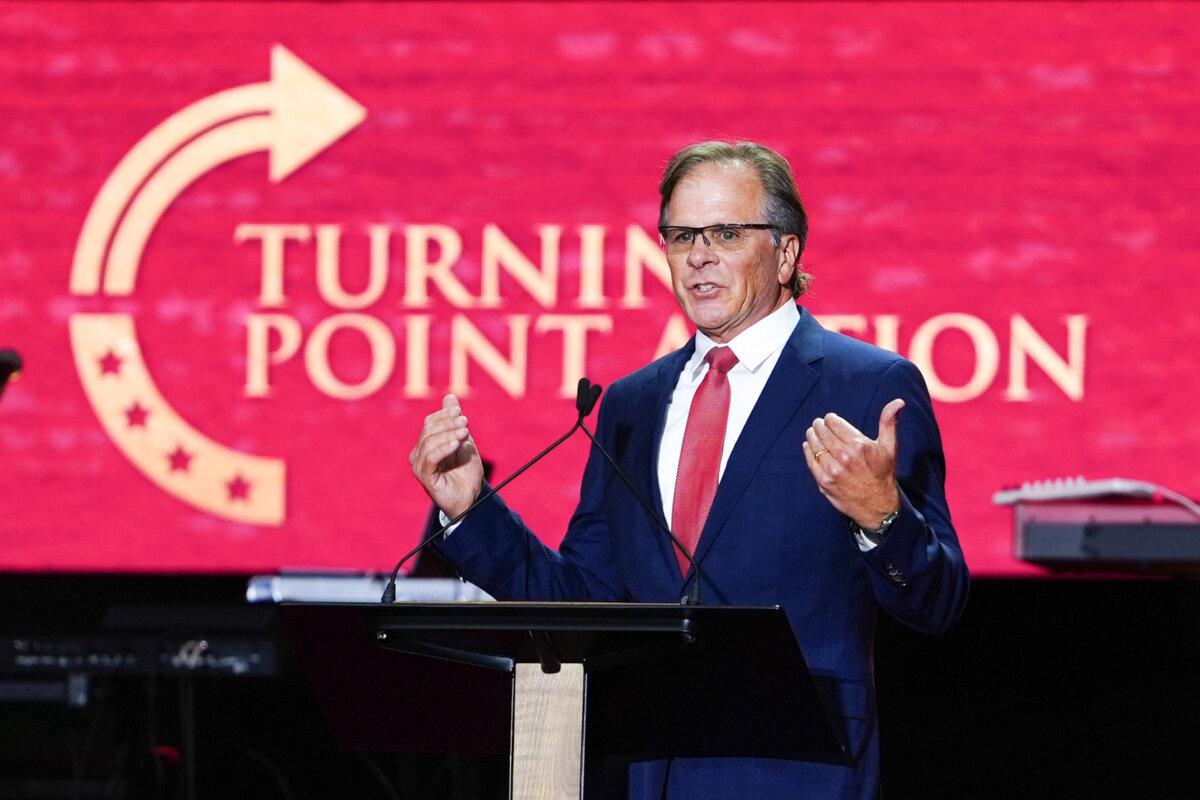 Radio host Frank Turek speaks at the Building a Legacy: Remembering Charlie Kirk Memorial event at the State Farm Stadium in Glendale, Ariz., on Sept. 21, 2025. (Madalina Kilroy/The Epoch Times)