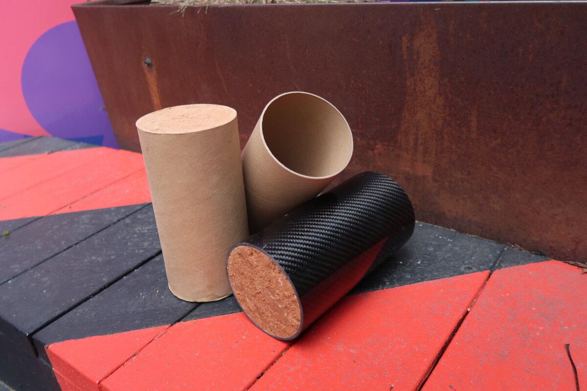 A cardboard-confined rammed earth column and carbon fibre-confined rammed earth column. (Courtesy of RMIT)