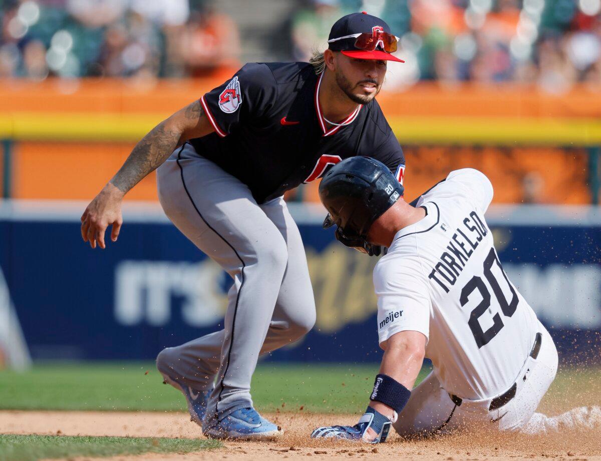 Shortstop Gabriel Arias of the Cleveland Guardians tags out Spencer Torkelson of the Detroit Tigers at second base for a double play during the ninth inning at Comerica Park in Detroit, Mich., on Sept. 18, 2025. (Duane Burleson/Getty Images)