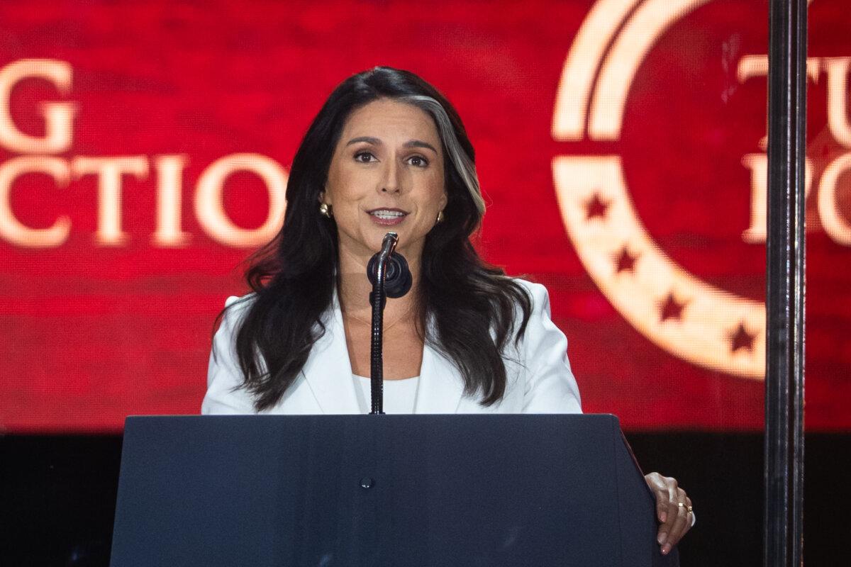 Director of National Intelligence Tulsi Gabbard speaks at the Building a Legacy: Remembering Charlie Kirk memorial event at State Farm Stadium in Glendale, Ariz., on Sept. 21, 2025. (Madalina Kilroy/The Epoch Times)
