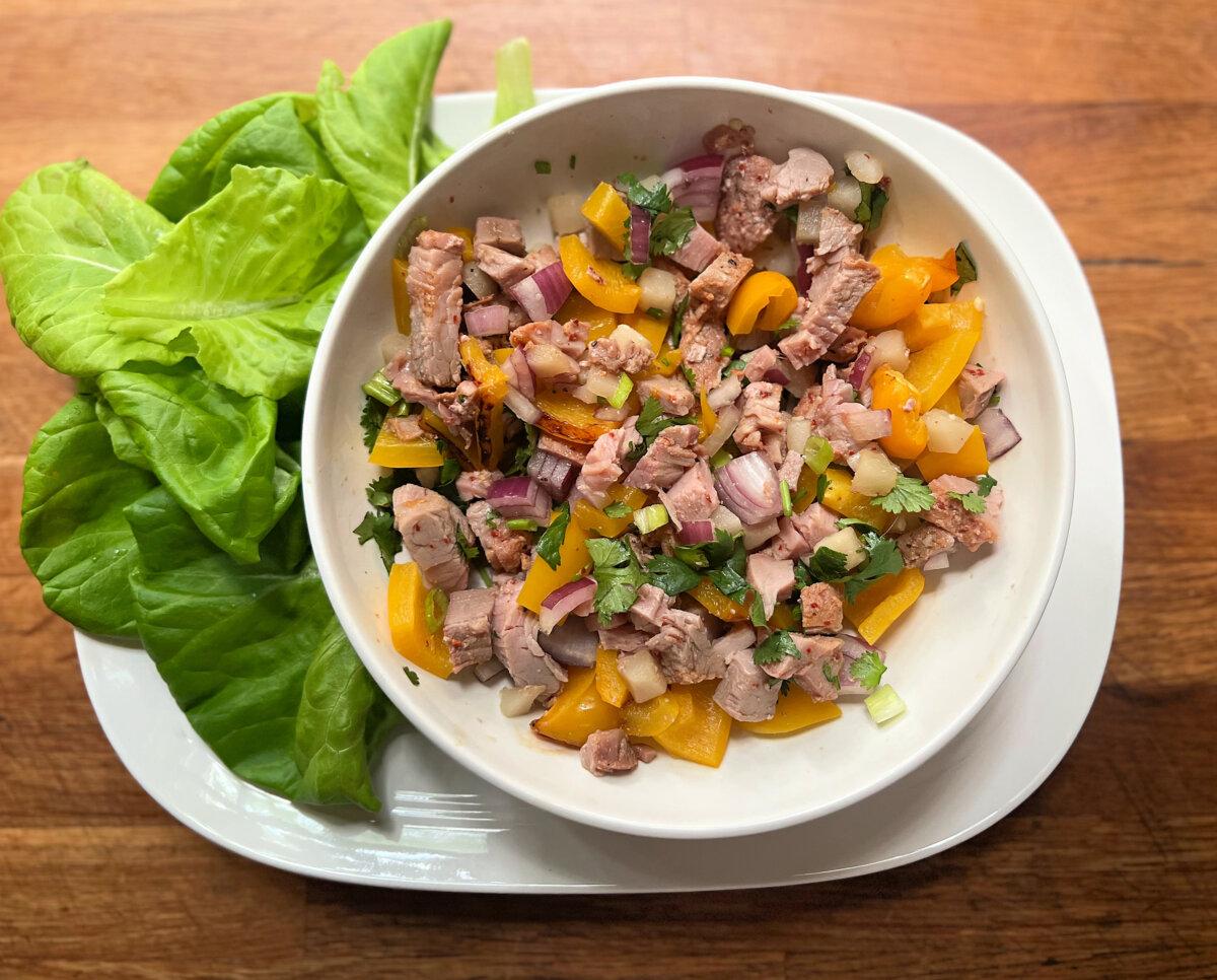 Tossed with roasted bell pepper and water chestnuts, teriyaki pork tenderloin makes a great filling for lettuce wraps. (Gretchen McKay/Pittsburgh Post-Gazette/TNS)