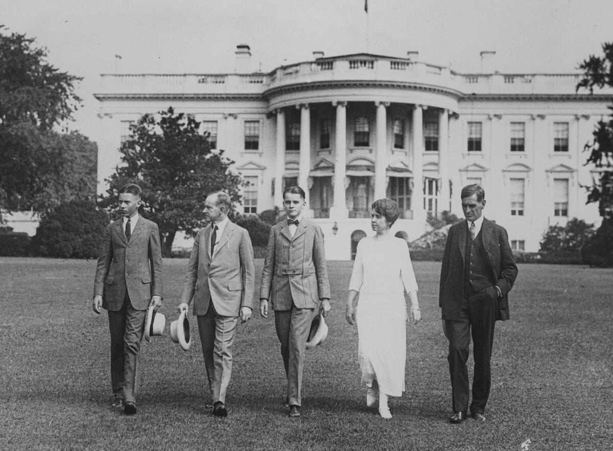 (L–R) John Coolidge, President Calvin Coolidge, Calvin Coolidge Jr., first lady Grace Coolidge, and George Christian at the White House, circa 1930. (FPG/Getty Images)