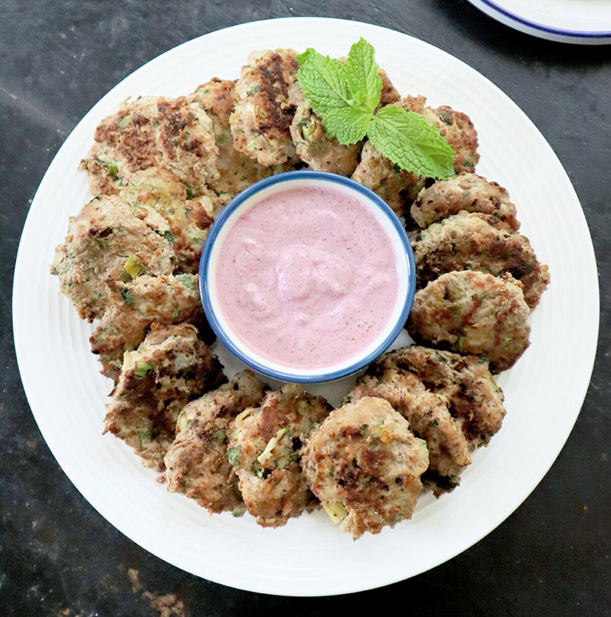 Served with a tangy, purple sumac sauce, these gluten-free turkey meatballs include a secret ingredient that's plentiful in later summer—shredded zucchini. (Gretchen McKay/Pittsburgh Post-Gazette/TNS)