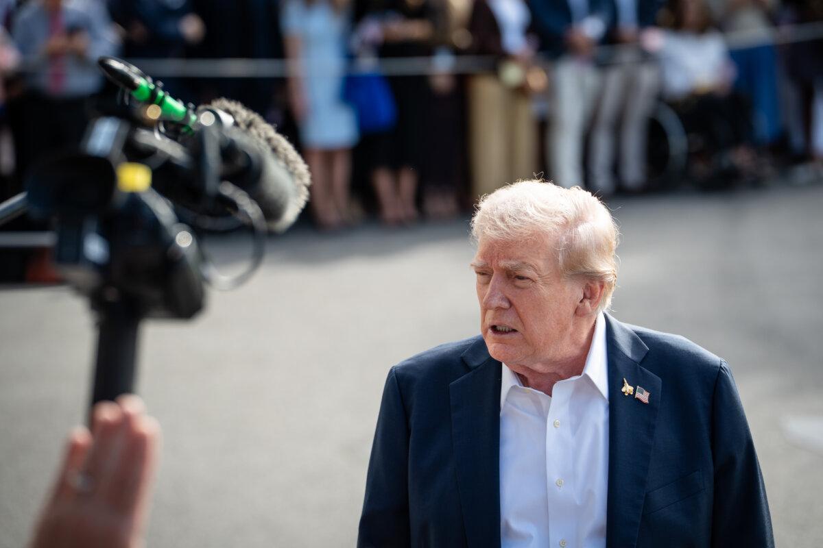 President Donald Trump speaks to reporters at the White House as he departs for the Ryder Cup golf competition in New York, on Sept. 26, 2025. (Madalina Kilroy/The Epoch Times)