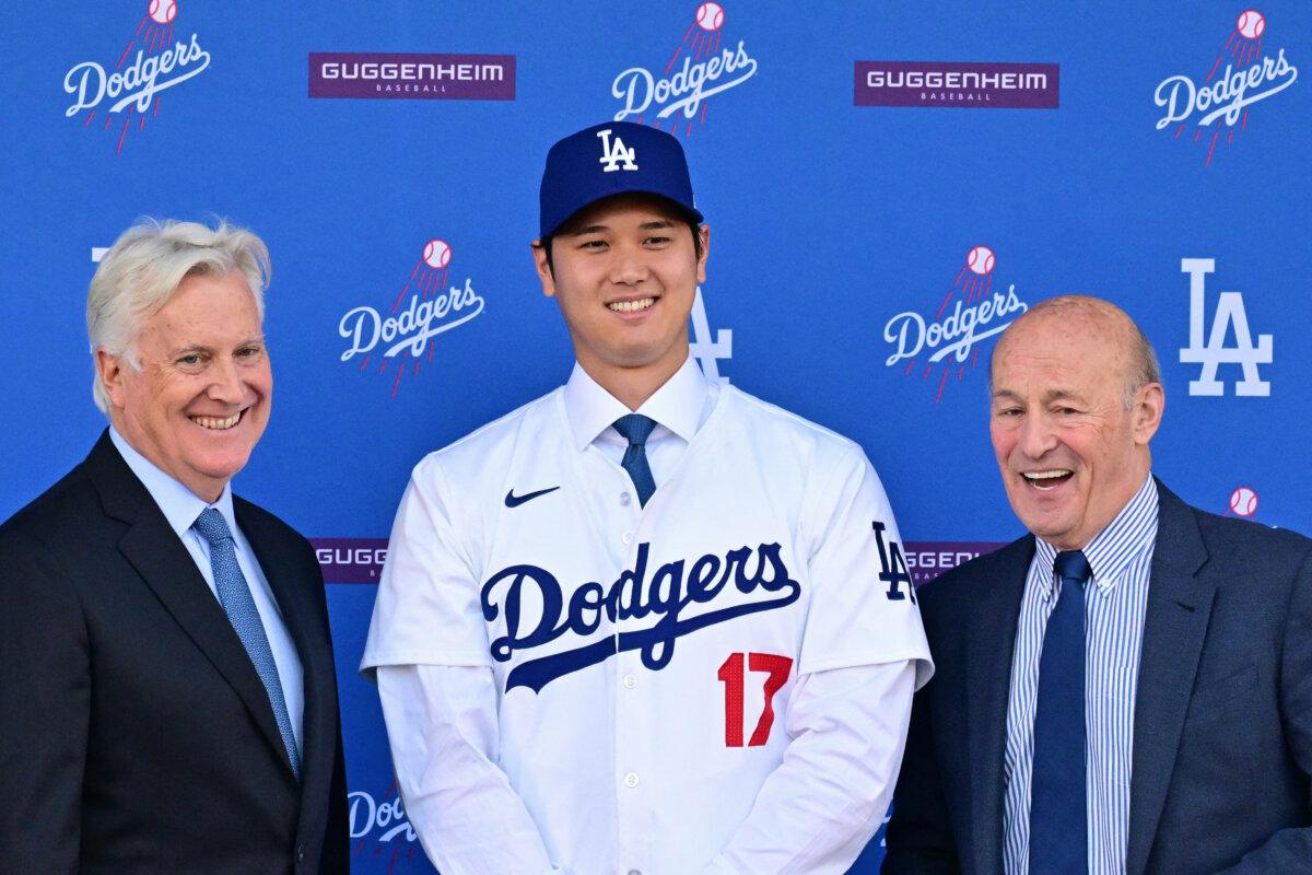 Potential Player Signings Make for Wild MLB Free Agency Spending Spree 2 Japanese baseball player Shohei Ohtani (C) poses with Mark Walter (L), owner of the Los Angeles Dodgers, and Andrew Friedman (R), president of baseball operations of the Los Angeles Dodgers, during a press conference on his presentation after signing a ten-year deal with the Los Angeles Dodgers at Dodgers Stadium in Los Angeles, on Dec. 14, 2023. (Frederic J. Brown/AFP via Getty Images)