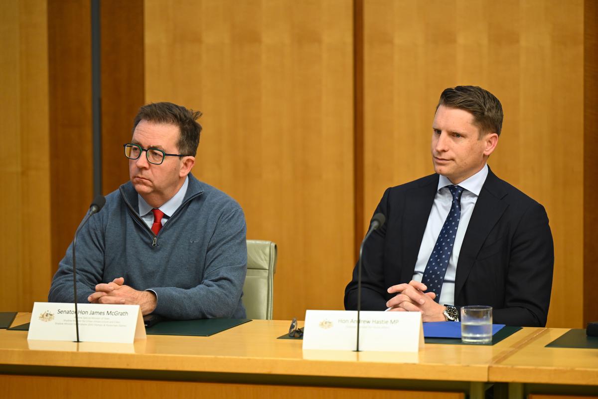 Shadow Home Affairs Minister Andrew Hastie and shadow Special Minister of State James McGrath attend a meeting of the shadow ministry at Parliament House in Canberra, Australia on June 26, 2025. (AAP Image/Lukas Coch)