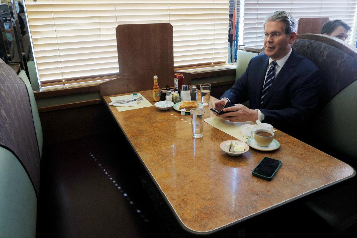 U.S. Secretary of the Treasury Scott Bessent waits between interviews during a Labor Day visit to Metro 29 Diner in Arlington, Va., on Sept. 1, 2025. (Brian Snyder/Reuters)