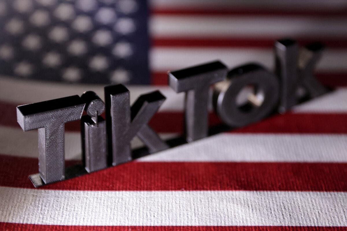 The TikTok logo is placed on a U.S. flag in this illustration taken on April 25, 2024. (Dado Ruvic/Illustration/File Photo/Reuters)