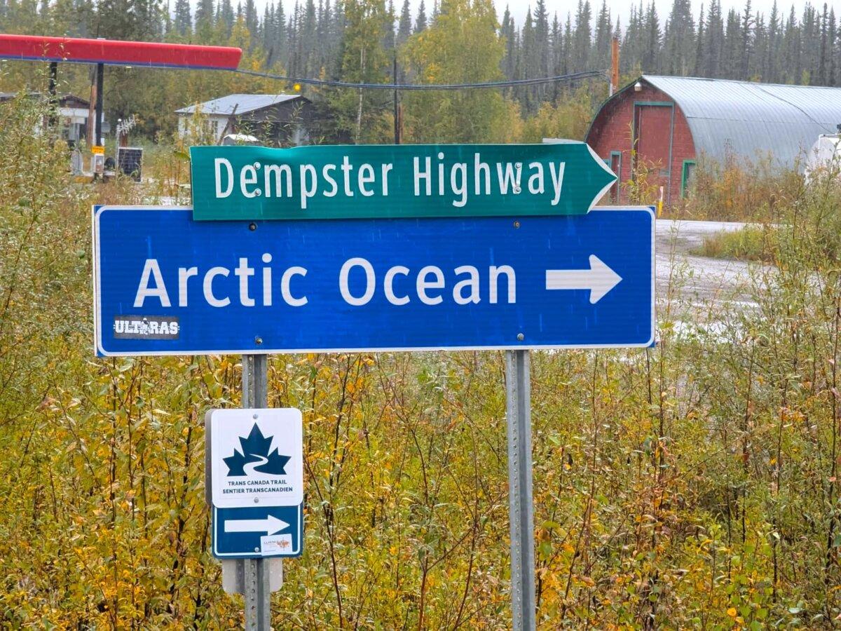 The Dempster Highway sign and the Arctic Ocean sign at the beginning of the Dempster highway in Dawson City, Yukon, in September 2024. (Courtesy Spinning Wheels Tour)