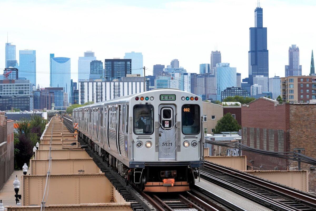 A Chicago Transit Authority train pulls into the new Damen Ave. station just two blocks from the United Center on Aug. 12, 2024. (Charles Rex Arbogast/AP Photo)