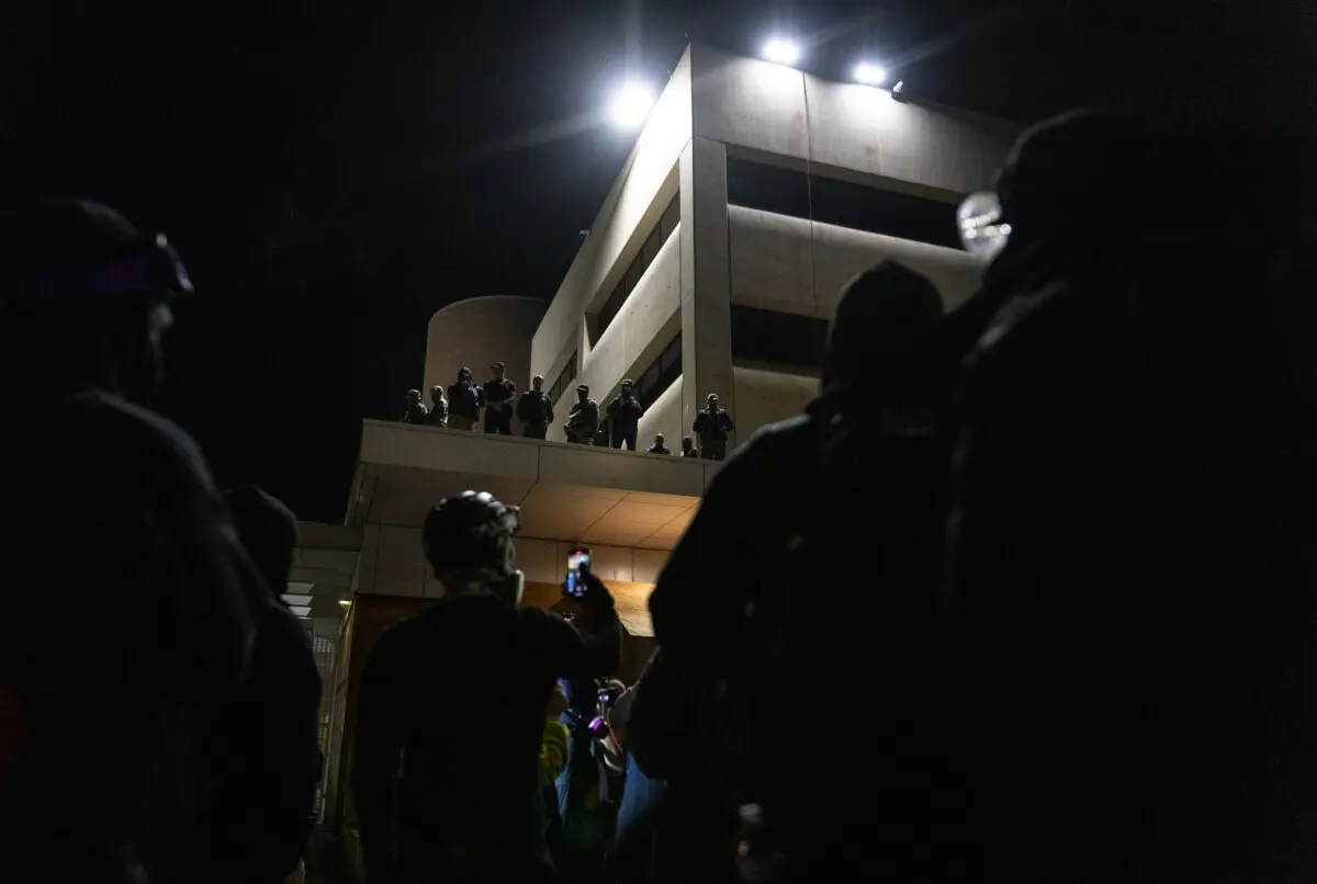 Protestors gather in front of Immigration and Customs Enforcement offices in Portland, Oregon, in this file photo. (John Fredricks/The Epoch Times)