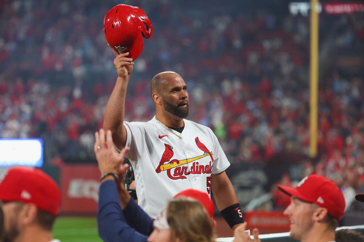 Albert Pujols #5 of the St. Louis Cardinals takes a curtain call after hitting his 701st career home run while playing against the Pittsburgh Pirates in the fourth inning at Busch Stadium in St Louis, Missouri on Sept. 30, 2022. (Dilip Vishwanat/Getty Images)