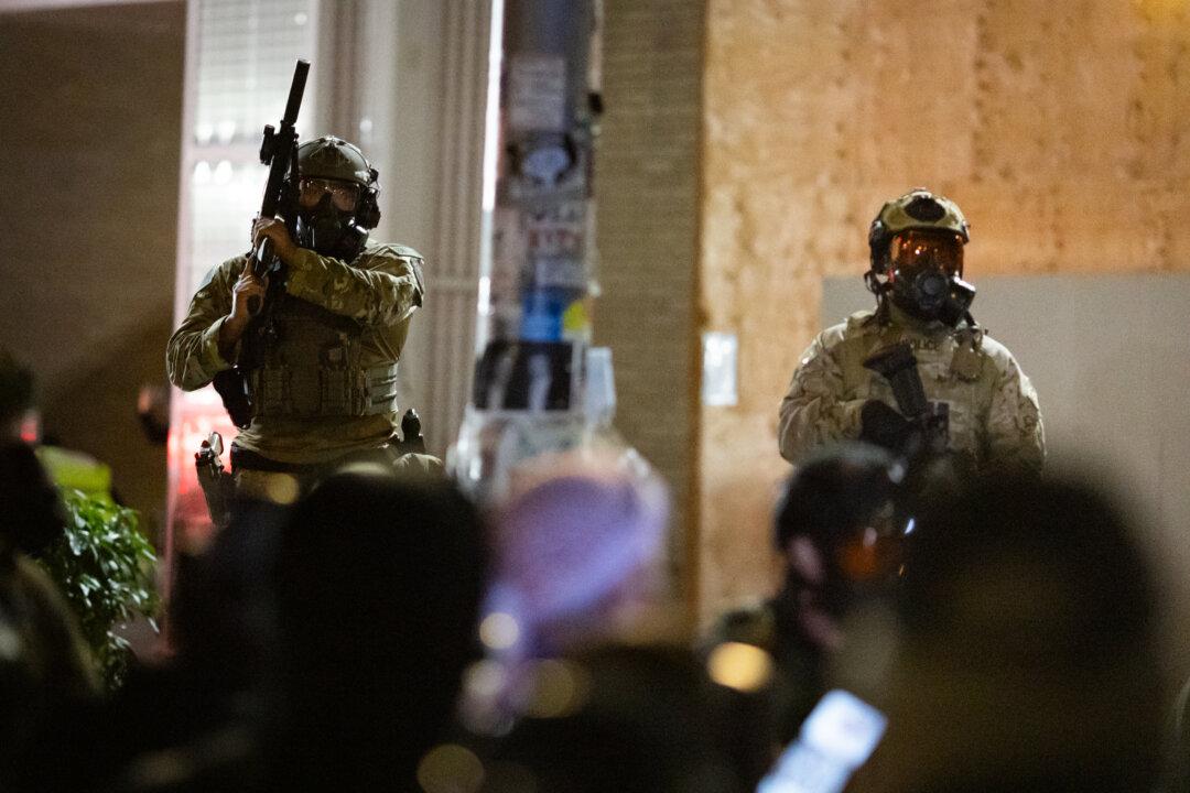 Trump Says He May Invoke Insurrection Act in Portland If Necessary