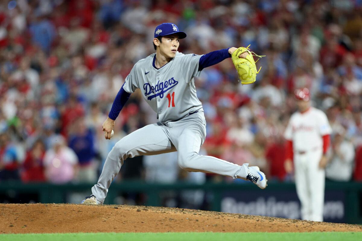 Roki Sasaki #11 of the Los Angeles Dodgers pitches in the ninth inning against the Philadelphia Phillies in game one of the Division Series at Citizens Bank Park in Philadelphia, Pennsylvania, on Oct. 04, 2025. (Emilee Chinn/Getty Images)
