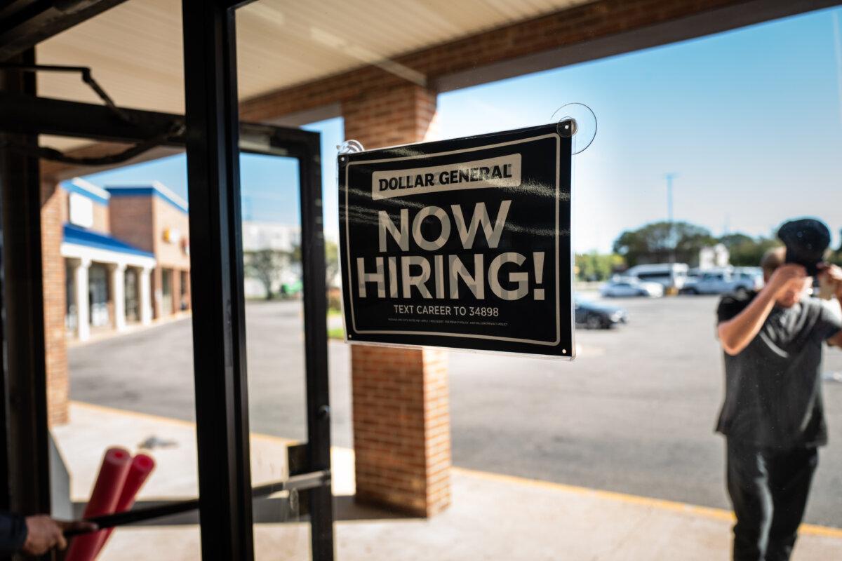 A "Now Hiring" sign at a store in Norfolk, Va., on Oct. 5, 2025. (Madalina Kilroy/The Epoch Times)