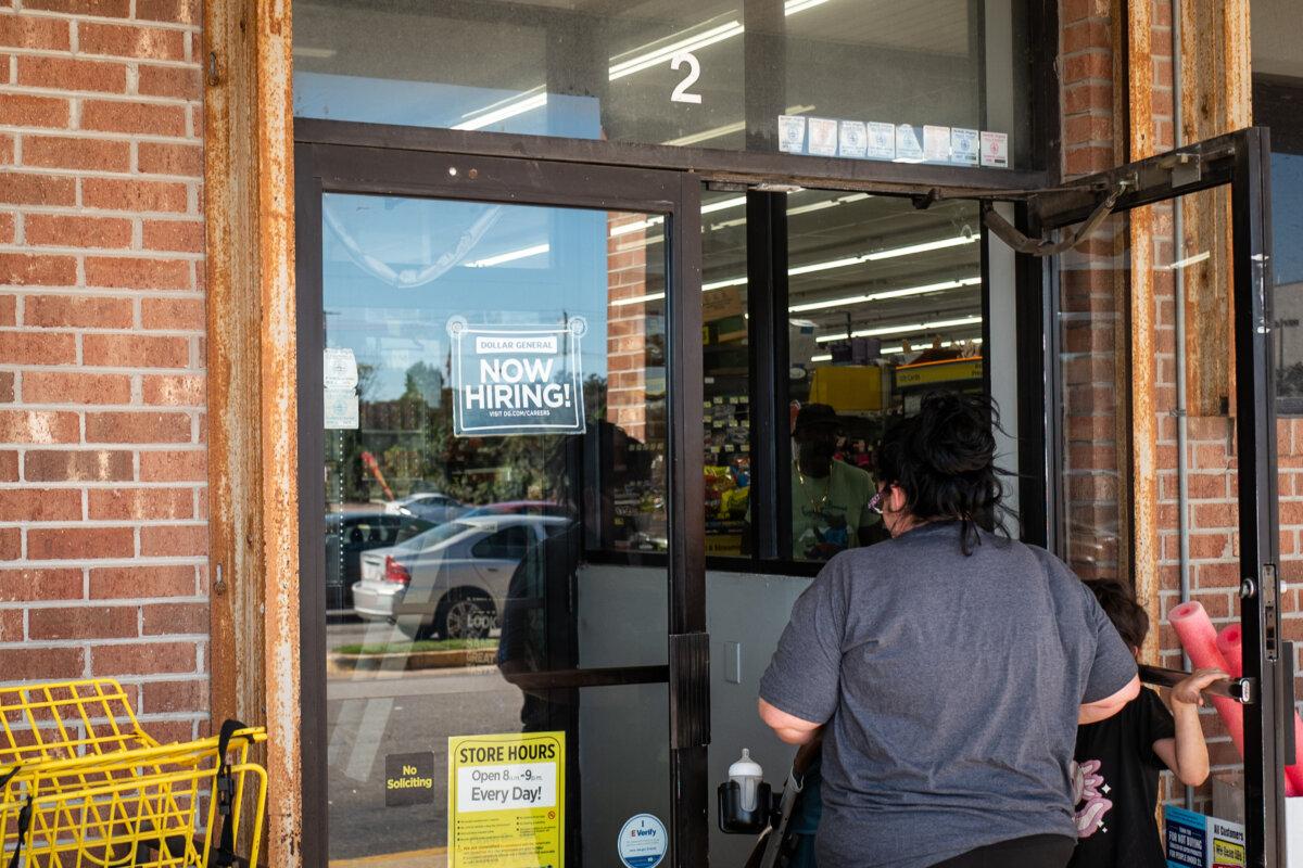 A 'Now Hiring' sign at a store in Norfolk, Va., on Oct. 5, 2025. (Madalina Kilroy/The Epoch Times)