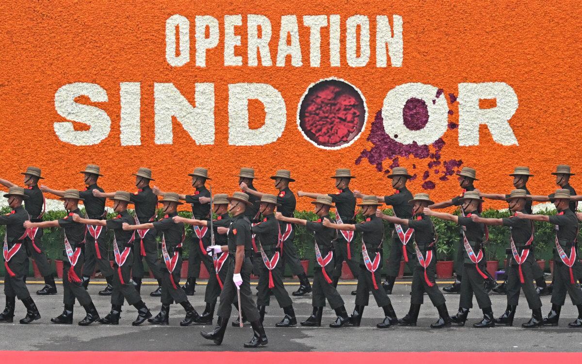 Indian soldiers march before the arrival of Prime Minister Narendra Modi at the Red Fort during the celebrations to mark country's Independence Day in New Delhi on Aug. 15, 2025. (Money Sharmer/AFP via Getty Images)