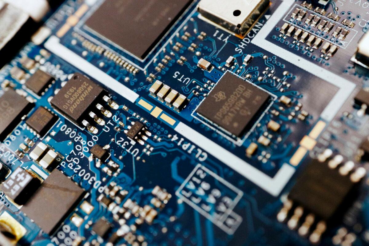 Semiconductor chips on a circuit board of a computer, in this illustration picture taken on Feb. 25, 2022. (Florence Lo/Reuters)