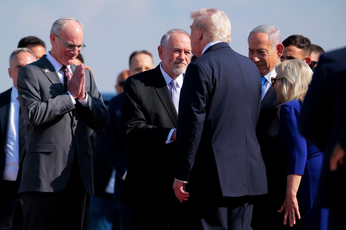 U.S. President Donald Trump is welcomed by Israeli Prime Minister Benjamin Netanyahu and officials at Ben Gurion International Airport in Tel Aviv, Israel, on Oct. 13, 2025. (Chip Somodevilla/Getty Images)