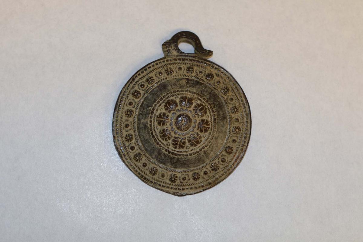 The markings on the medallions led researches to believe the artifacts trace back to the medieval age. (Courtesy of Simon Fraser University)