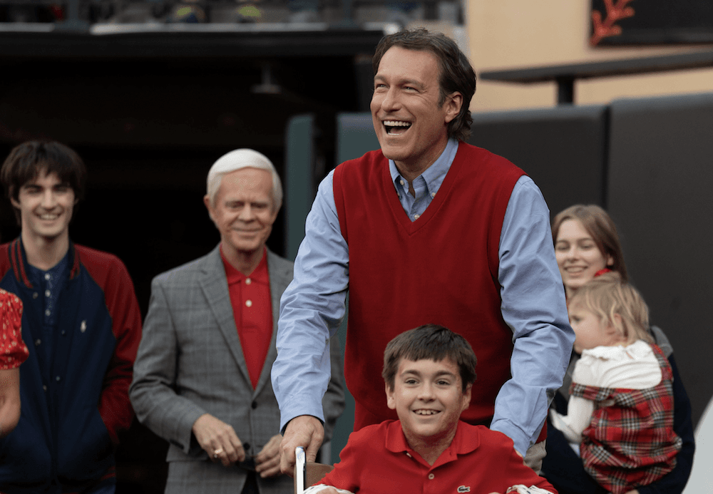 Jack Buck (William H. Macy, 2nd L), Denny O’Leary (John Corbett), and young John O'Leary (James McCracken) get ready to make an appearance at a St. Louis Cardinals game, in "Soul on Fire." (Sony Pictures Releasing)