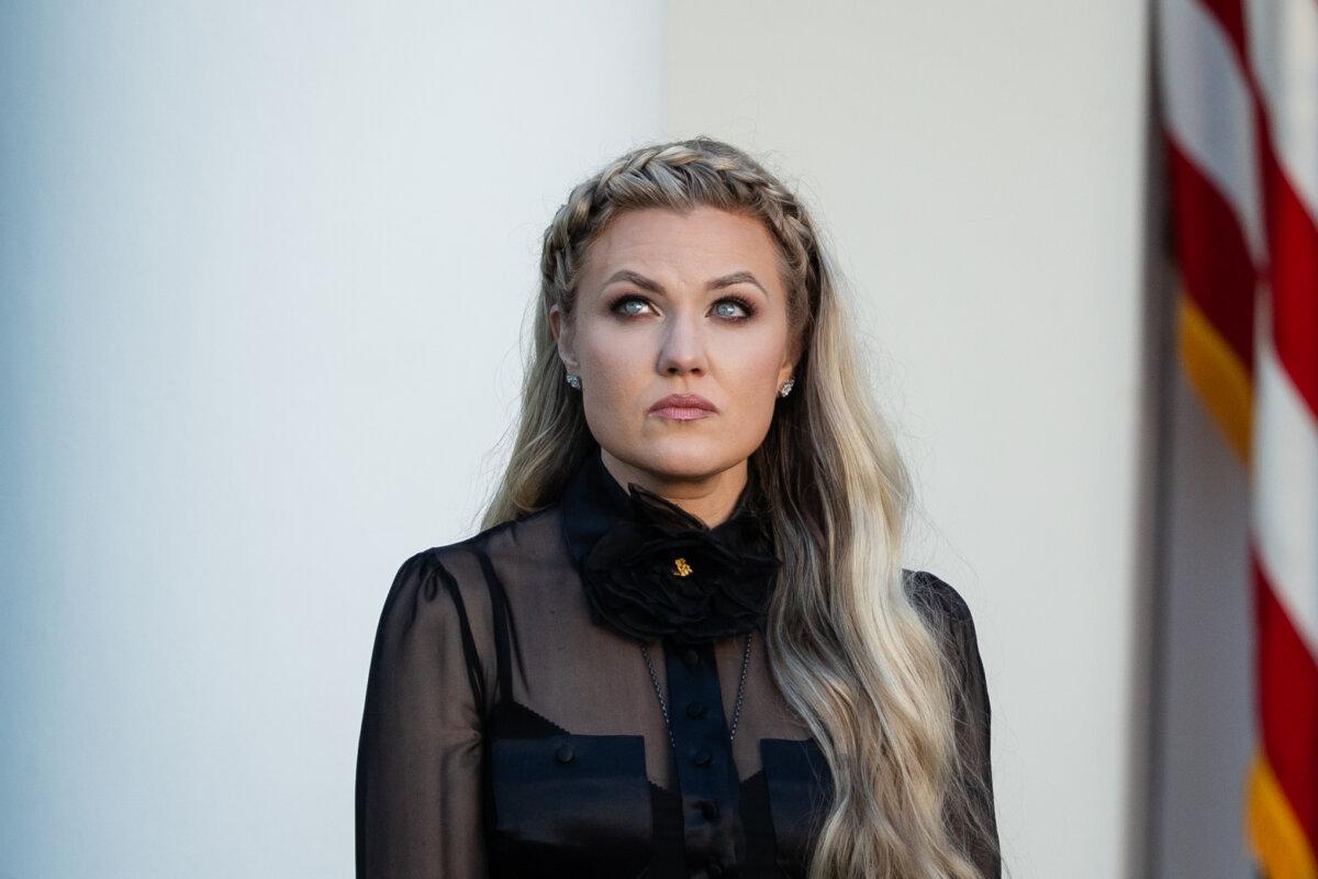Erika Kirk listens as President Donald Trump posthumously awards the Presidential Medal of Freedom to her husband, Charlie Kirk, in the Rose Garden of the White House on Oct. 14, 2025. (Madalina Kilroy/The Epoch Times)
