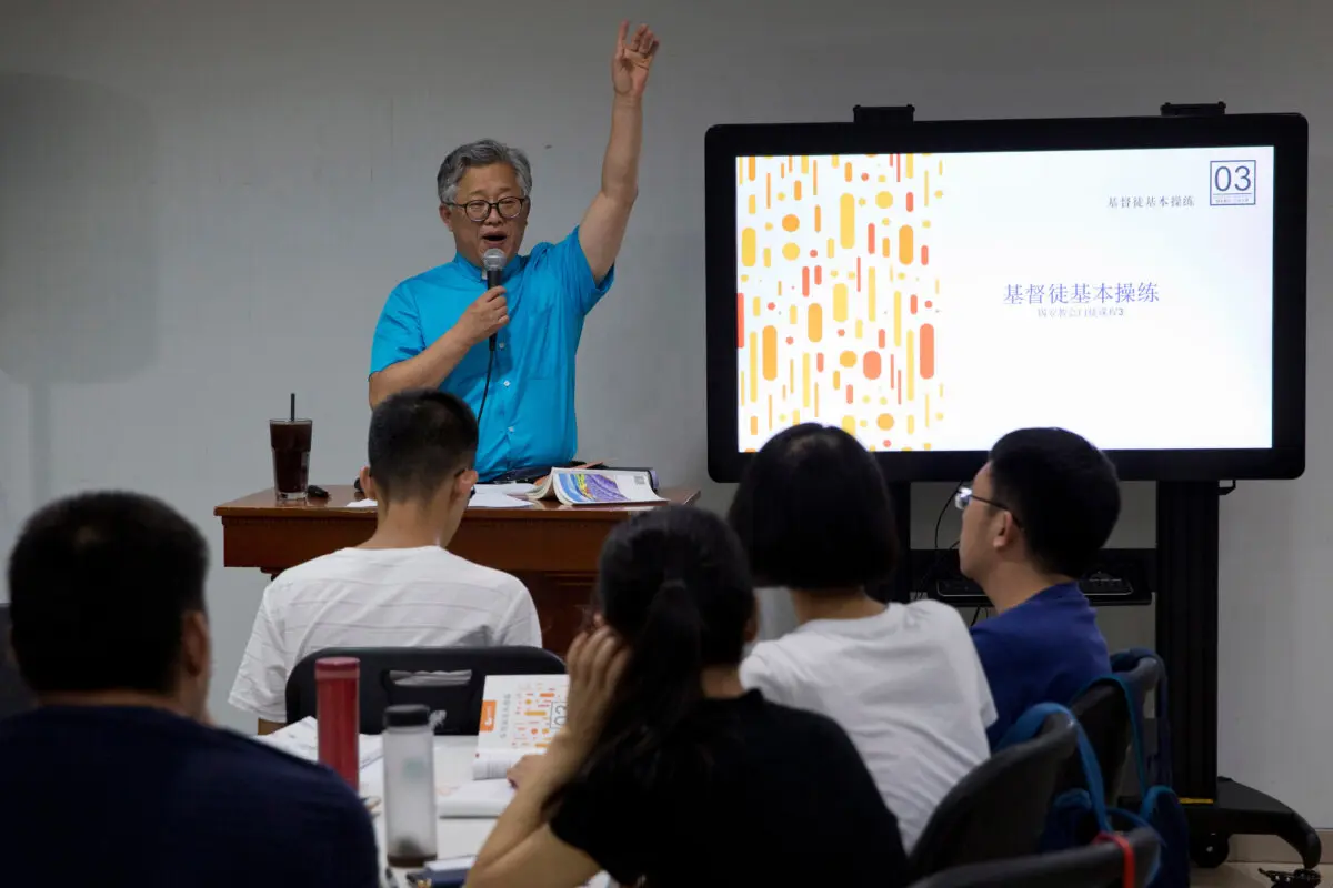 Pastor Jin Minri leads a class on the basics of Christian beliefs at the Zion Church in Beijing on Aug. 4, 2018. (Ng Han Guan/AP Photo)
