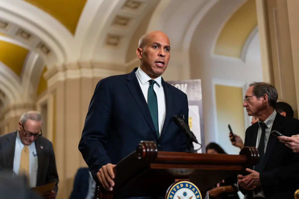 Sen. Cory Booker (D-N.J.) speaks to reporters during the government shutdown at a press conference on Capitol Hill in Washington on Oct. 15, 2025. (Madalina Kilroy/The Epoch Times)