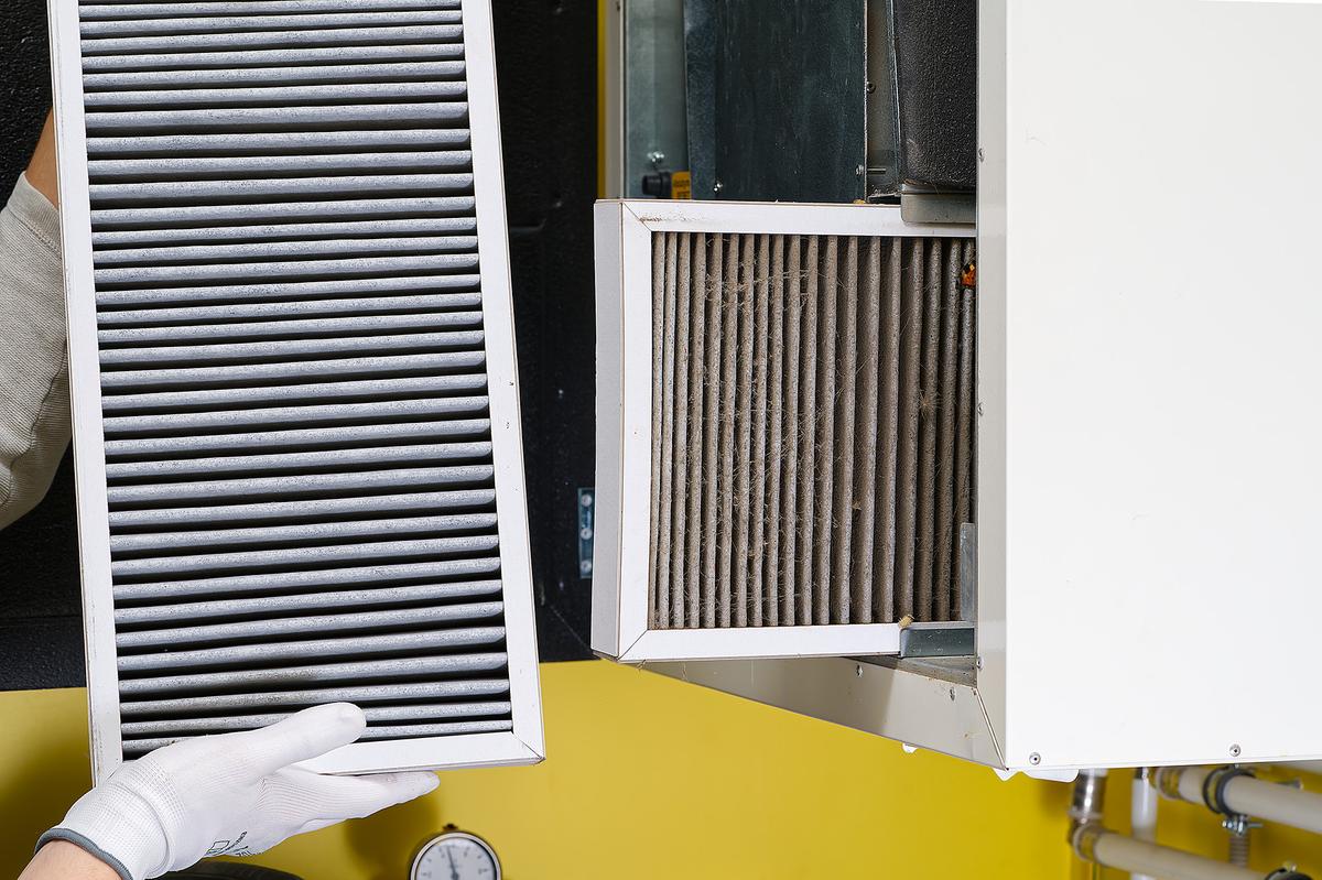 A clogged air filter is one of the most common causes of HVAC problems. Replacing filters regularly keeps the system running efficiently. (InFocus.ee/Shutterstock)