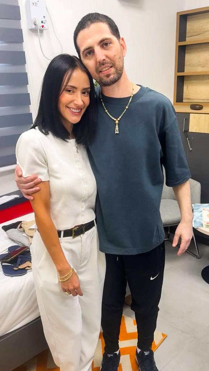 Elkana Bohbot reunites with his wife. (IDF)