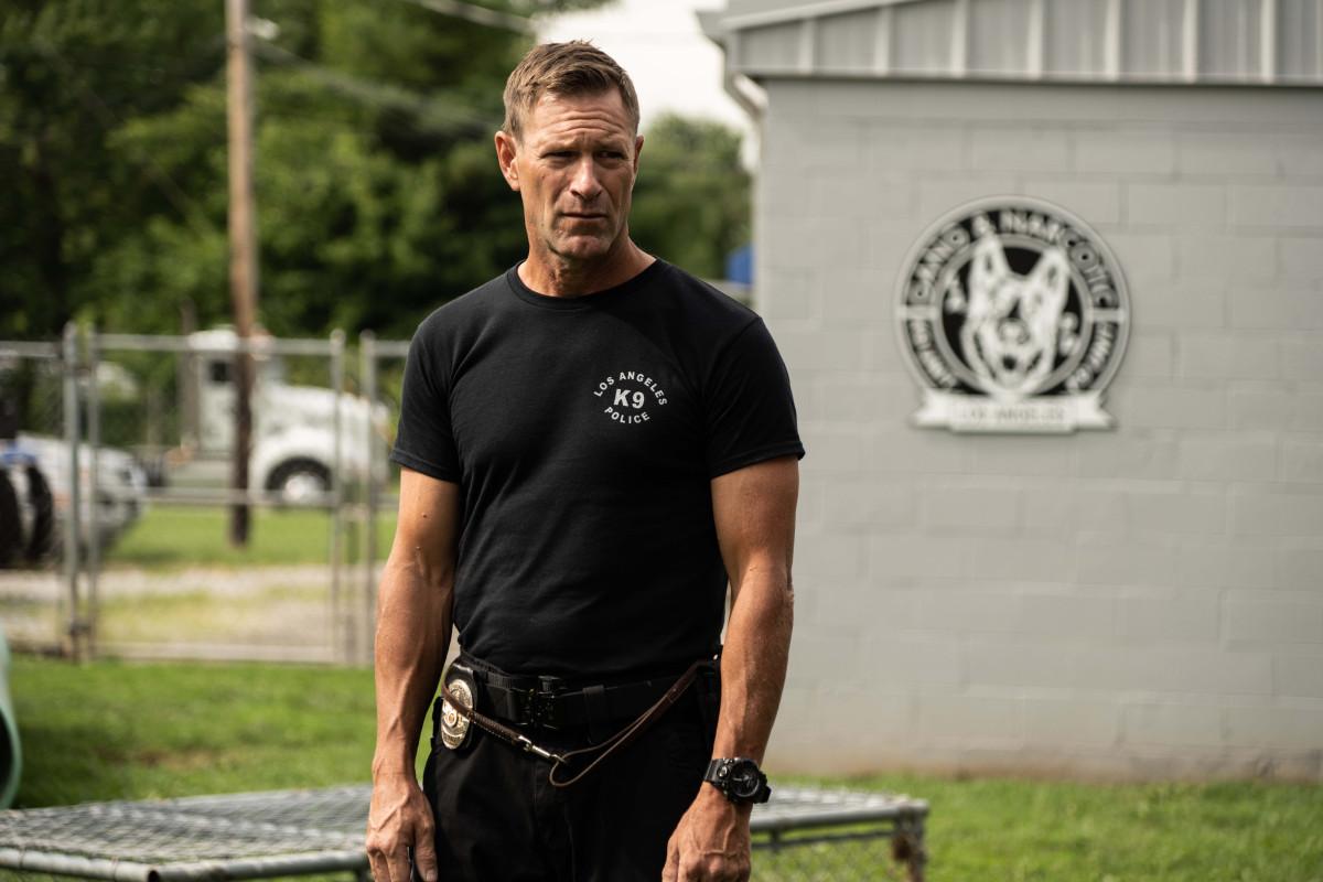 Aaron Eckhart as Jake Rosser in "Muzzle: City of Wolves." (RLJE Films)
