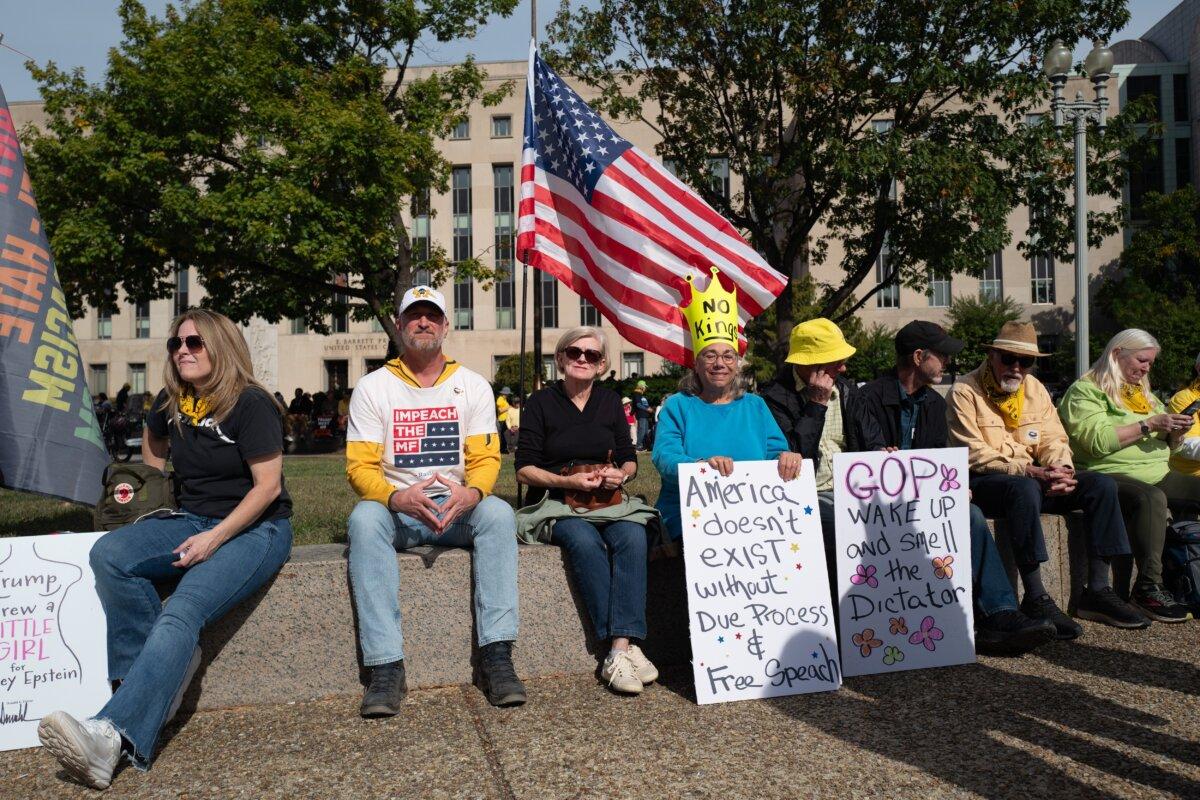 People participate in a "No Kings" protest in Washington, on Oct. 18, 2025. (Madalina Kilroy/The Epoch Times)