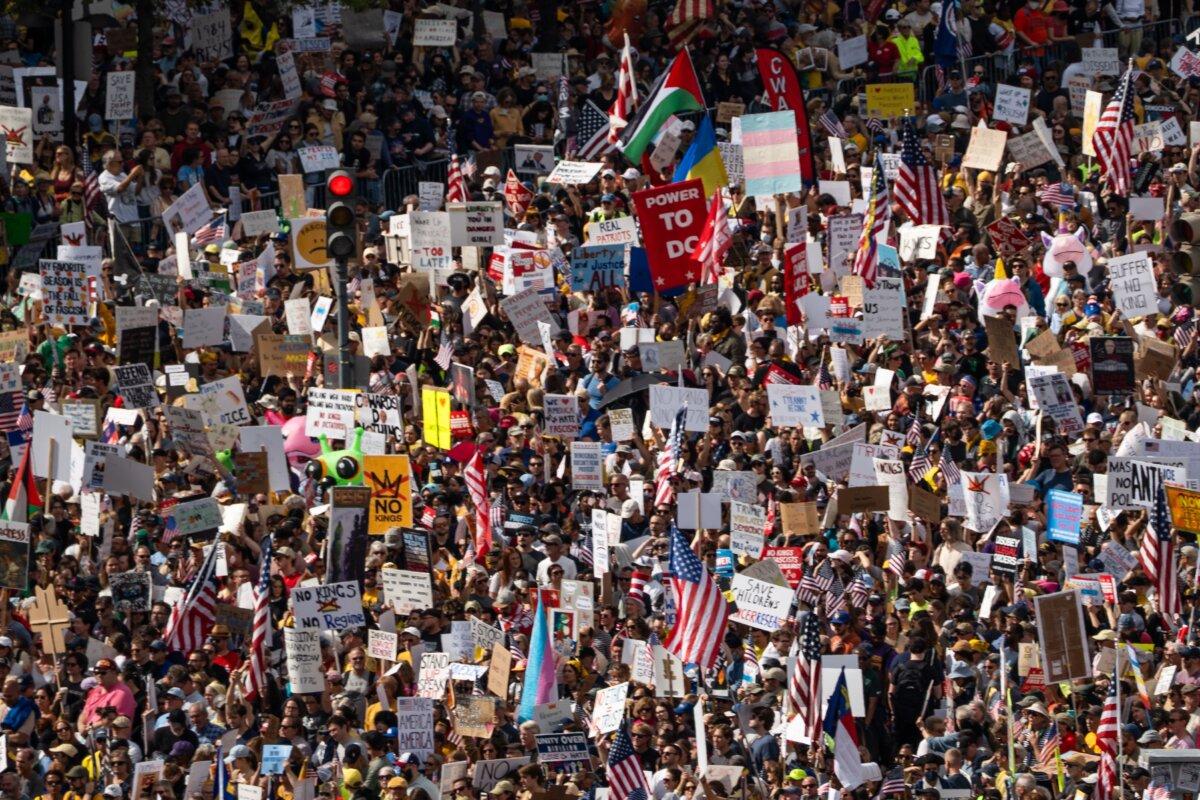 People participate in a "No Kings" protest in Washington, on Oct. 18, 2025. (Madalina Kilroy/The Epoch Times)