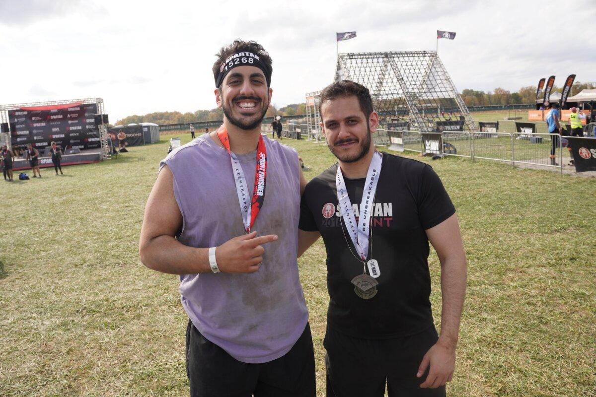 Cousins Jaad Haddad (L) and Brandon Khalil (R) at the 2025 Tri-State New York Spartan Event Weekend in the Town of New Hampton, N.Y., on Oct. 19, 2025. (Oliver Mantyk/The Epoch Times)