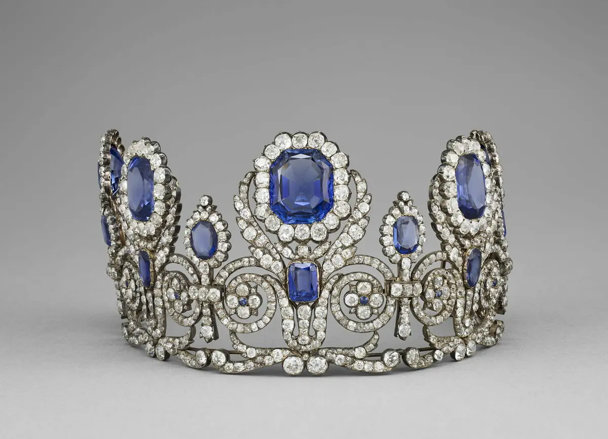 French Heritage Heist: The Sparkly Stories Behind the Louvre’s Stolen Jewels | USNN World News Tiara of the adornment of Queen Marie-Amélie and Queen Hortense from the early 19th century. Diamond and Ceylon sapphire; 2 7/16 inches by 4 1/5 inches. (Stéphane Maréchalle/ Musée du Louvre)