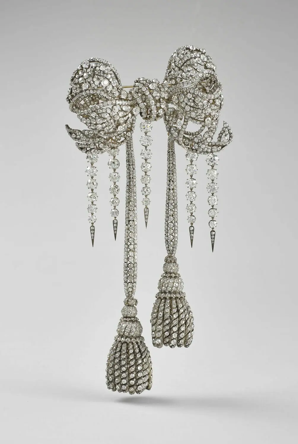 French Heritage Heist: The Sparkly Stories Behind the Louvre’s Stolen Jewels | USNN World News Large bodice bow of Empress Eugénie, 1855, by François Kramer. Silver, diamond, gold; 1 3/8 inches by 8 3/4 inches by 4 1/10 inches. (Stéphane Maréchalle/ Musée du Louvre)