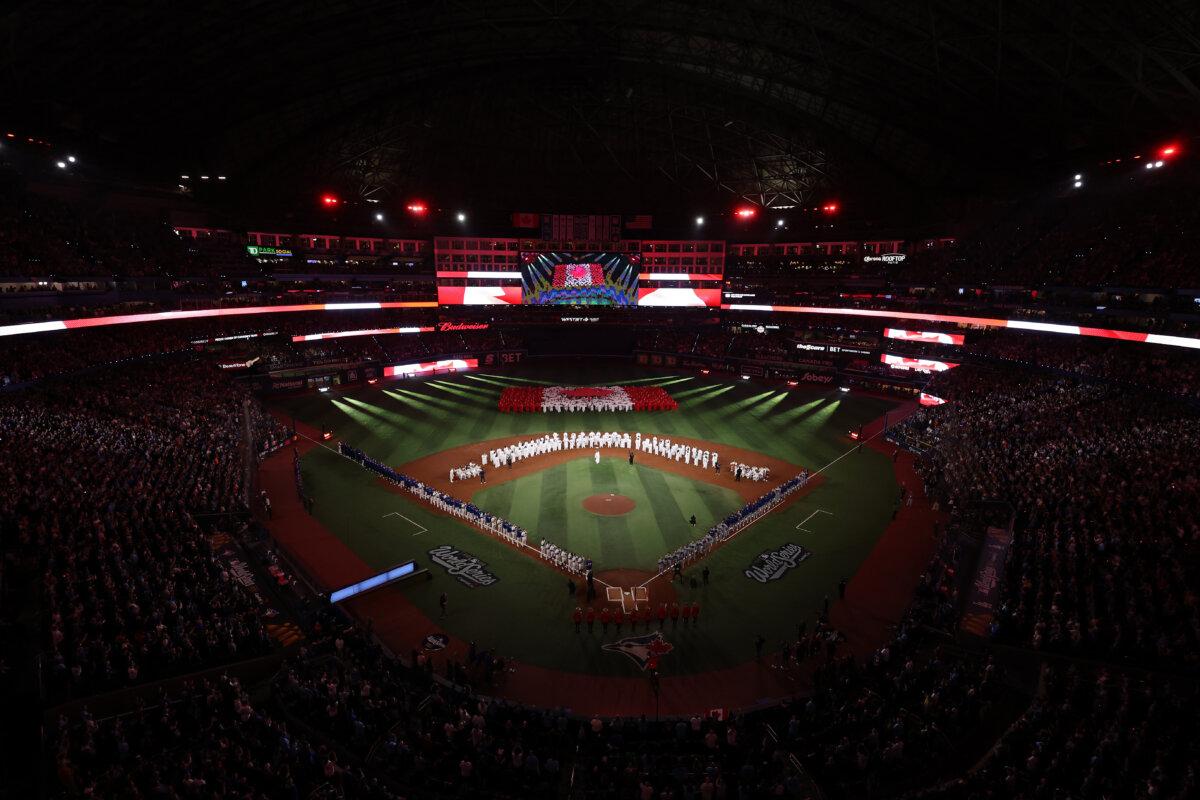 A general view of the interior of Rogers Centre during the playing of the national anthem before Game 1 of the 2025 World Series between the Toronto Blue Jays and the Los Angeles Dodgers in Toronto on Oct. 24, 2025. (Emilee Chinn/Getty Images)