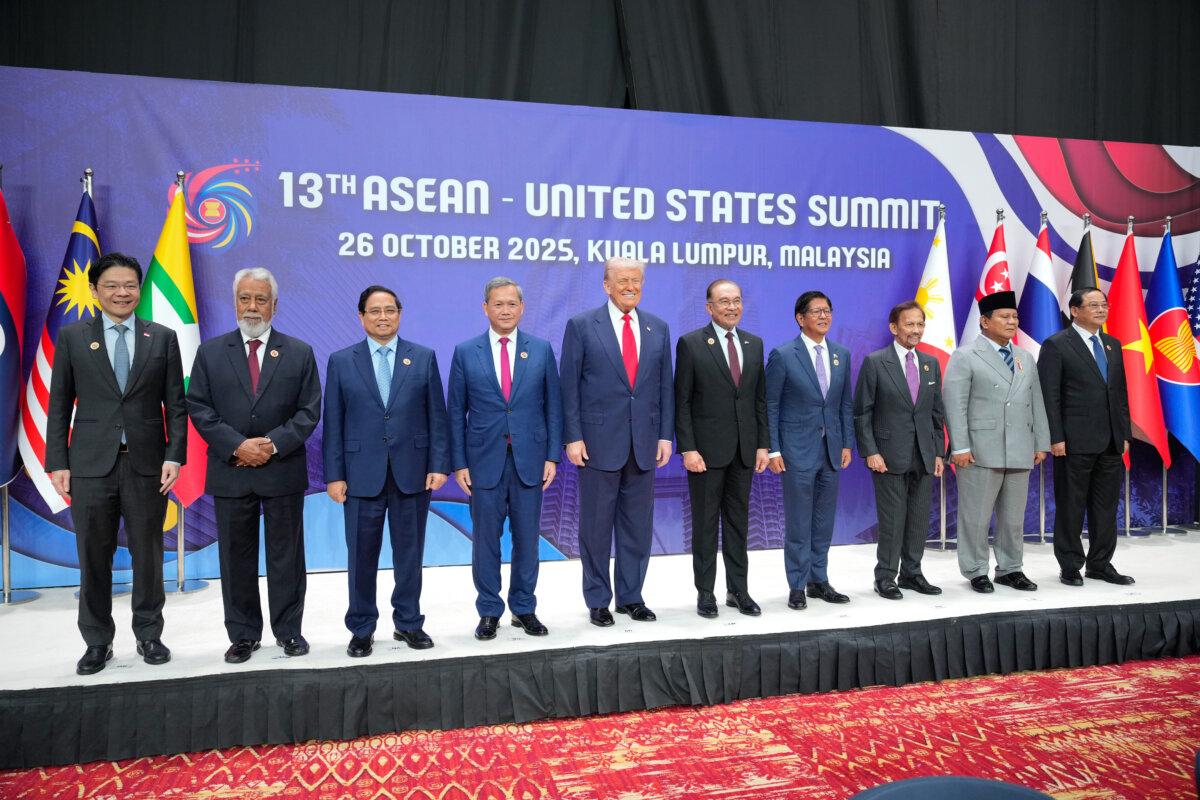 U.S. President Donald Trump (center L) poses with other leaders during the Association of Southeast Asian Nations Summit in Kuala Lumpur, Malaysia, on Oct. 26, 2025. (AP Photo/Vincent Thian, Pool)