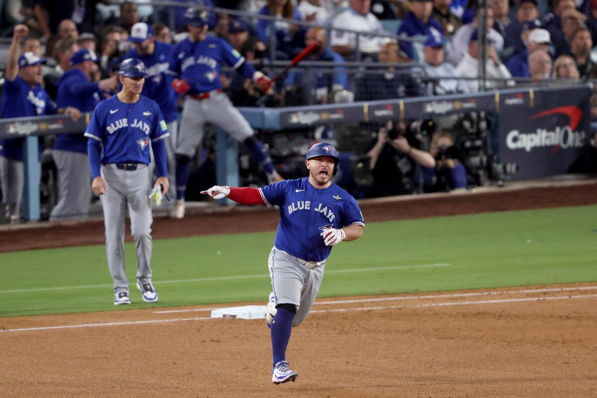 Alejandro Kirk of the Toronto Blue Jays rounds the bases after hitting a three-run home run against the Los Angeles Dodgers during the fourth inning in Game 3 of the 2025 World Series at Dodger Stadium in Los Angeles on Oct. 27, 2025. (Luke Hales/Getty Images)