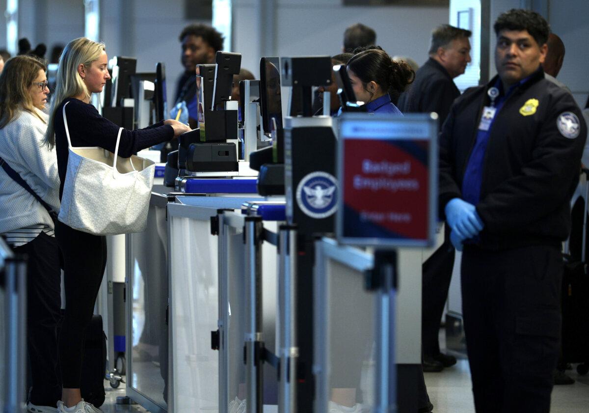 Passengers go through TSA checkpoints at Ronald Reagan Washington National Airport in Arlington, Va., on Oct. 27, 2025. (Alex Wong/Getty Images)