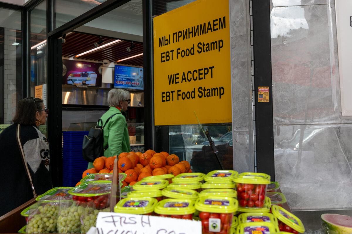 People shop for food at a store that accepts food stamps in New York City, in an undated file photograph. (Spencer Platt/Getty Images)