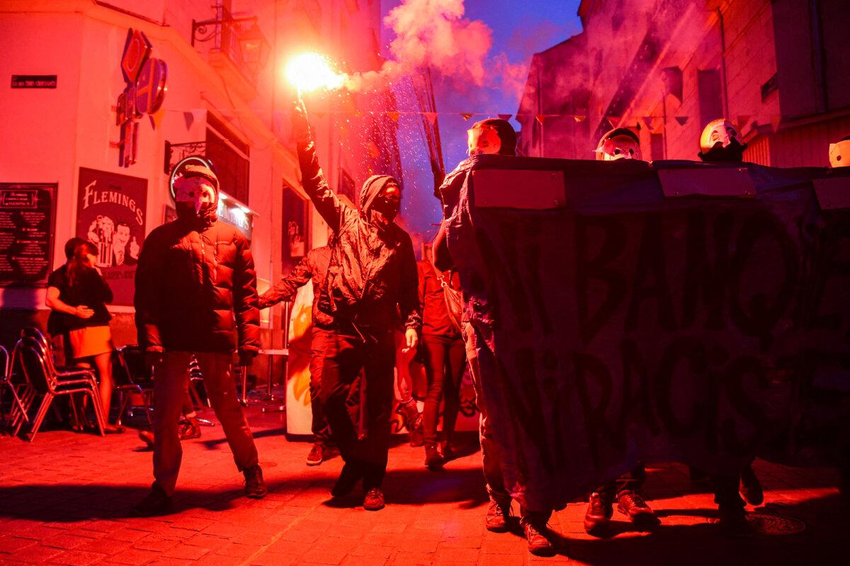 Antifa members gather to demonstrate following the announcement of the results of the first round of the presidential election, in Nantes, France, on April 23, 2017. (Jean-Sebastien Evrard/AFP via Getty Images)