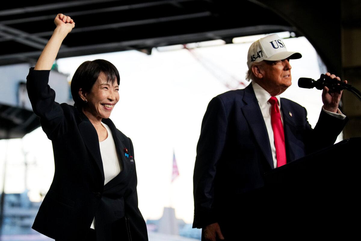 Japanese Prime Minister Sanae Takaichi and U.S. President Donald Trump speak to troops aboard USS George Washington at Fleet Activities Yokosuka in Yokosuka, Japan, on Oct. 28, 2025. (Andrew Harnik/Getty Images)