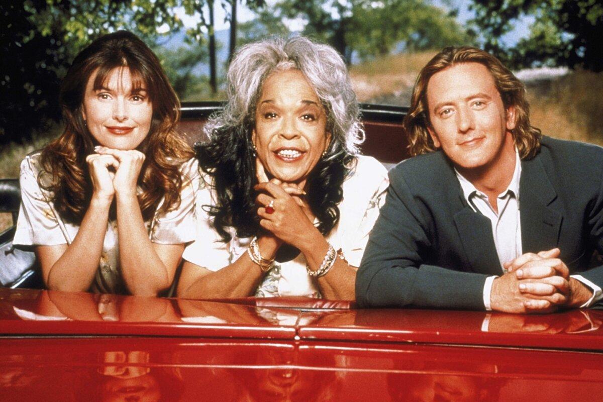 A promotional shot of the TV series "Touched by an Angel" starring (L-R) Roma Downey, Della Reese, and John Dye. (MovieStillsDB)