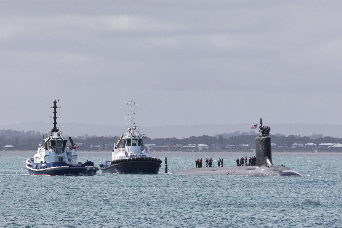 The USS Vermont (SSN-792), a U.S. Virginia-class nuclear-powered attack submarine, arrives at HMAS Stirling naval base in Perth, Australia, on Oct. 29, 2025. The Vermont arrived for a Submarine Maintenance Period (SMP), marking progress under the AUKUS partnership towards establishing the Submarine Rotational Force West. (Antony Dickson/AFP via Getty Images)