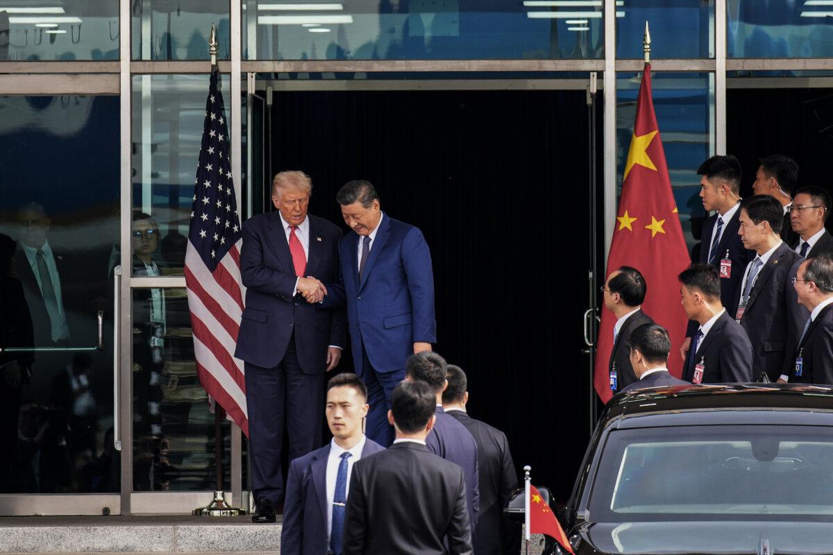 U.S. President Donald Trump and Chinese leader Xi Jinping shake hands as they depart following a bilateral meeting at Gimhae Air Base in Busan, South Korea, on Oct. 30, 2025. (Andrew Harnik/Getty Images)