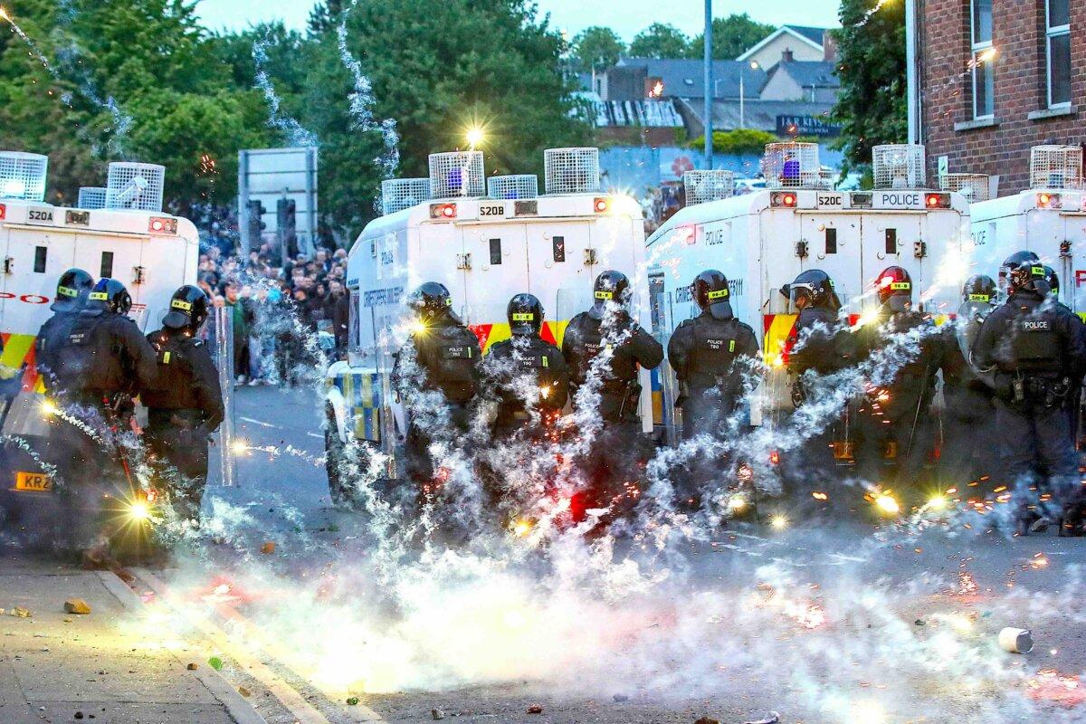 Riot police seen during anti-immigration demonstrations in Ballymena, Northern Ireland, on June 11, 2025. The UK increased crackdown on online posts in recent years during the anti-immigration protests and counter-protests and other demonstrations featuring vandalism violence. (Paul Faith/AFP via Getty Images)