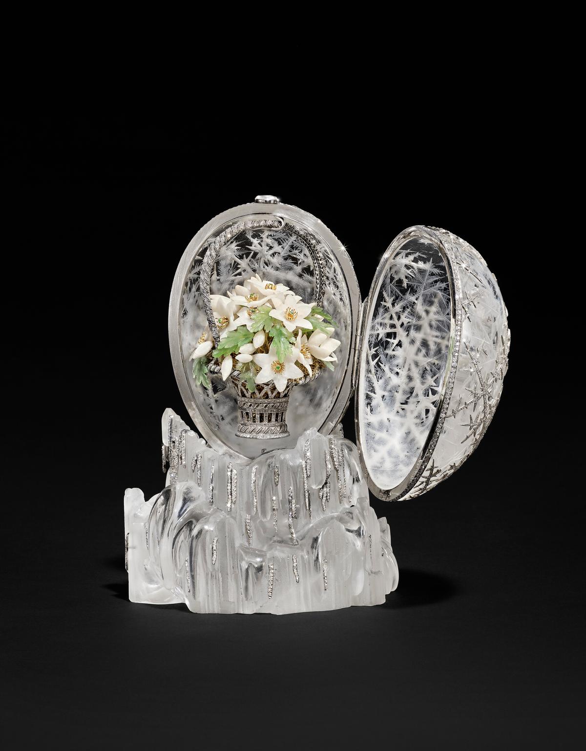 "The Winter Egg," 1913, designed by Alma Theresia Pihl with Fabergé. The egg with base measures 5 5/8 inches tall and the "surprise" measures 3 1/4 inches tall. (Christie's)