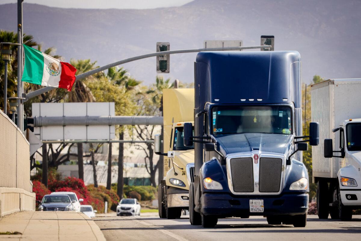 Trucks coming from Mexico enter the United States at an inspection station after crossing the border in Otay Mesa, Calif., on April 1, 2025. (Sandy Huffaker/AFP via Getty Images)